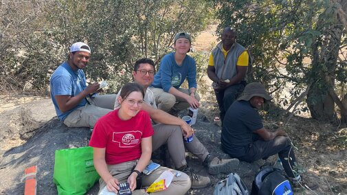 EWB-NU Zambia Team having lunch at the bridge site